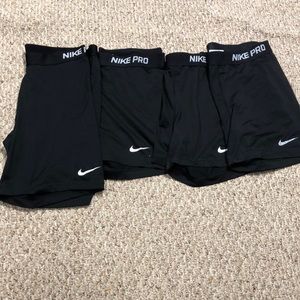 4 pairs of Nike spandex. Sz xl.